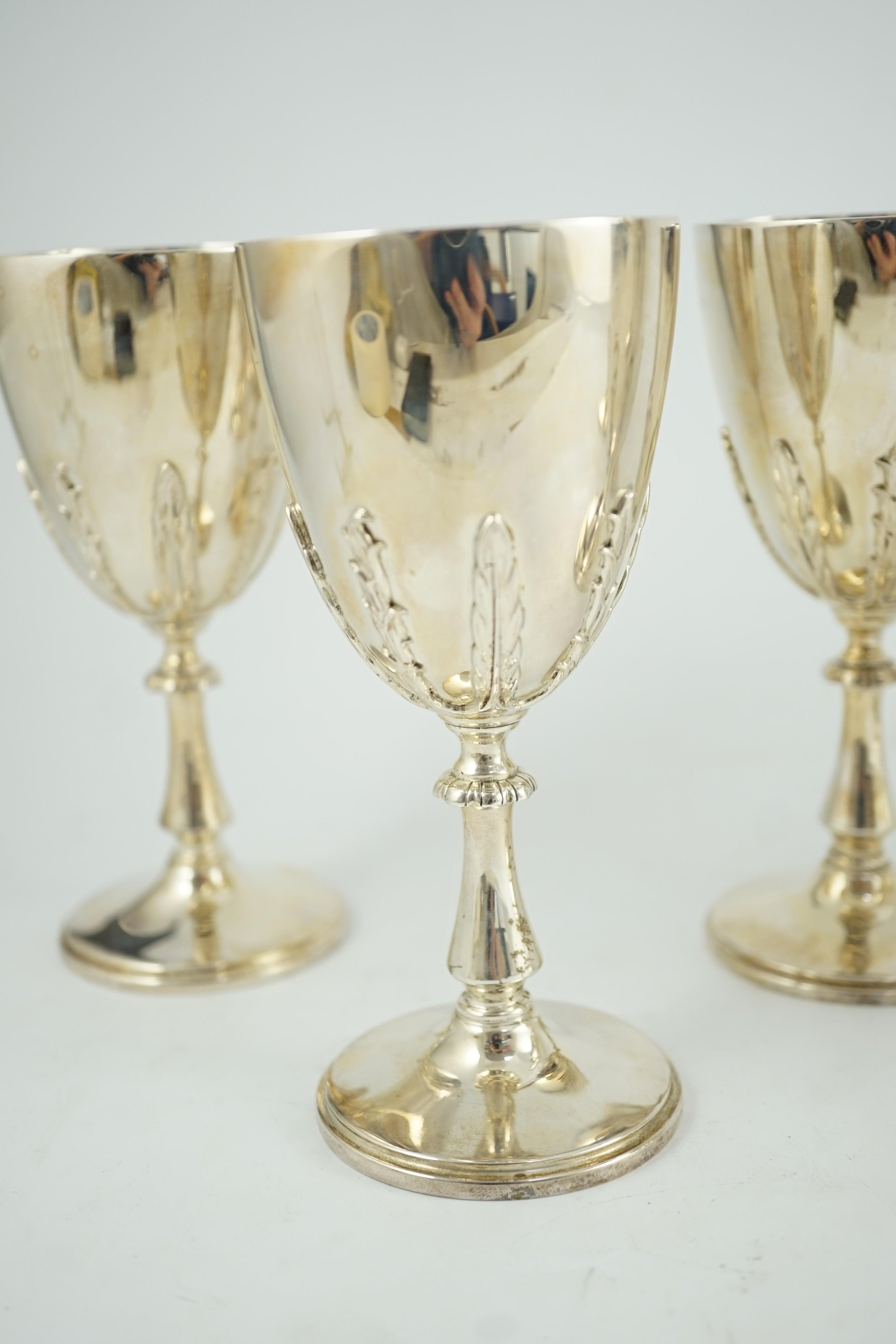 A modern cased silver ewer and six matching goblets by Courtman Silver Ltd